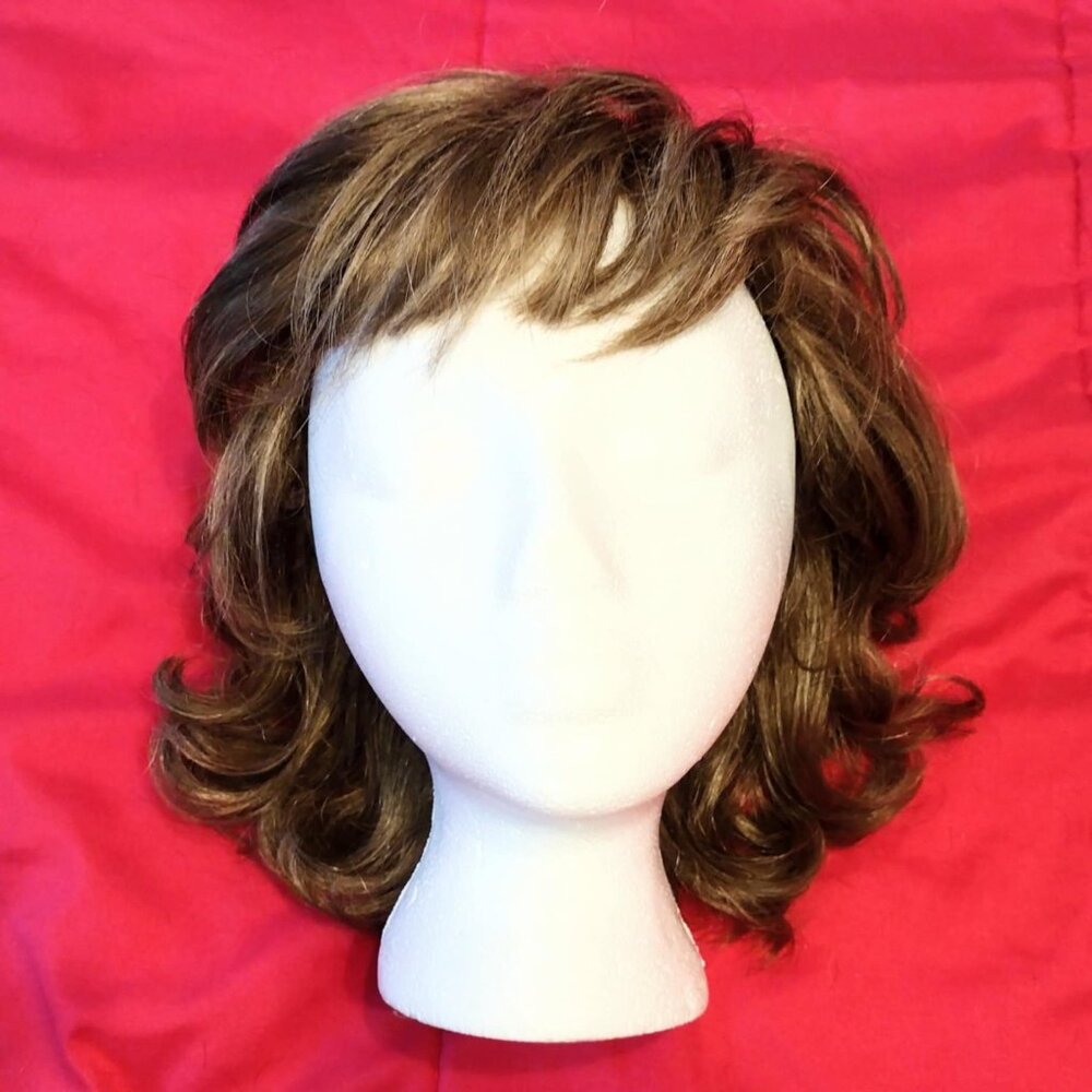 TLC Light Brownish Blonde Wavy Nora Style Wig With 10” Styrofoam Head